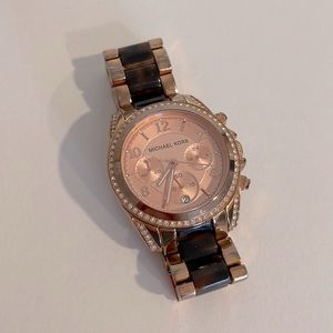 MK rose gold and tortoise watch